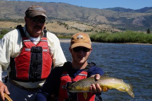 Will S. and his guide Shannon showing off Will's new personal best brown trout. 