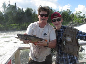 Max caught this truly once in a lifetime trophy wild Maine Brook Trout. I lost my hat and got a little dirty trying to get this beast into the net but it was well worth it.