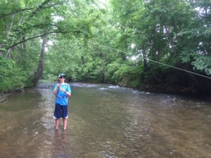 Austin fighting a Davidson River trophy trout.