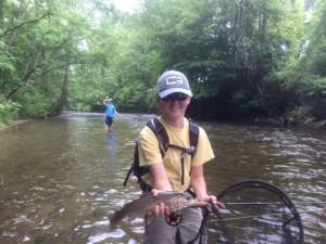 Mack shows off a healthy Davidson River Rainbow.